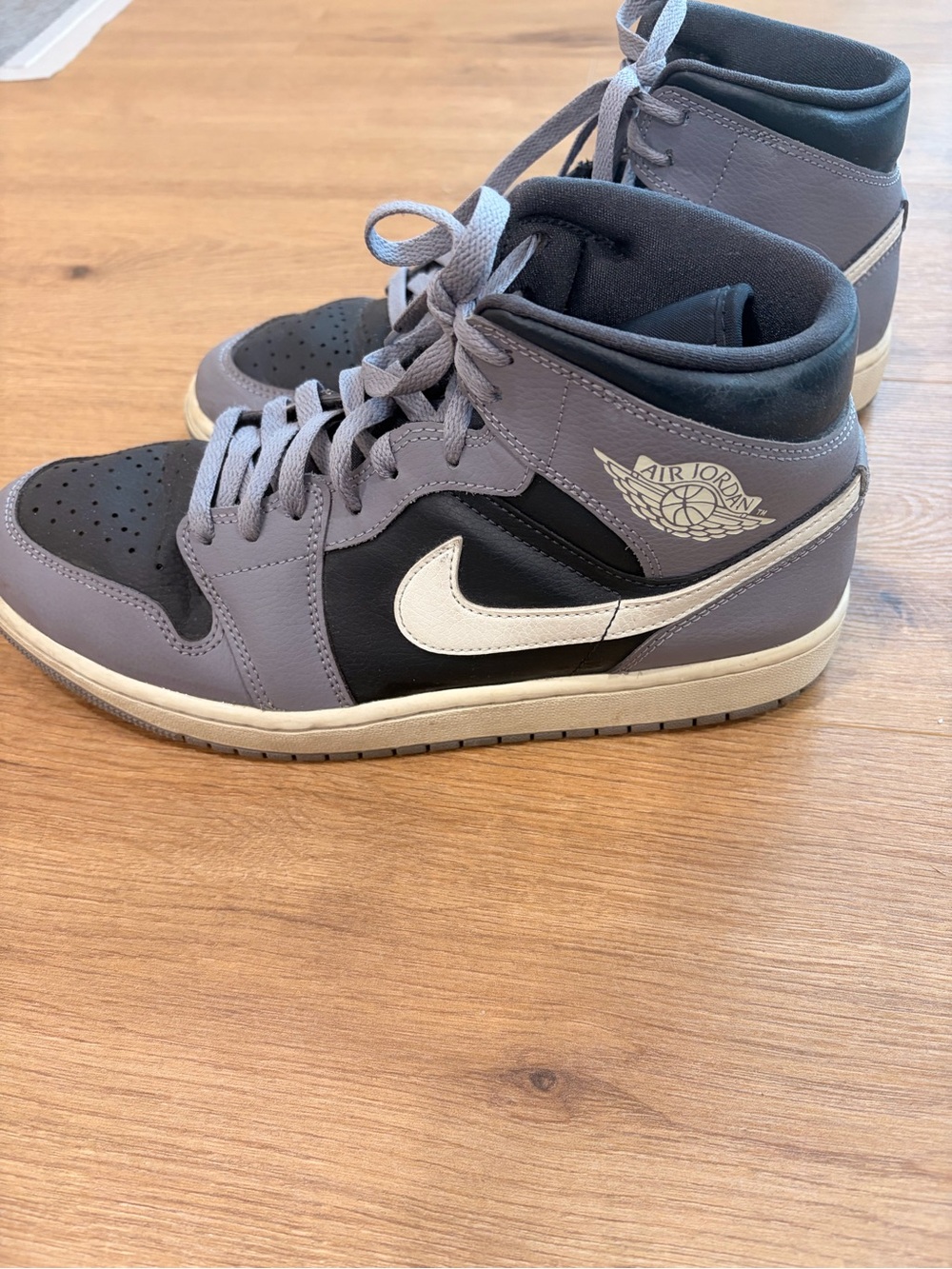 Women’s Size 11- Air Jordan 1 Mid Cement Grey